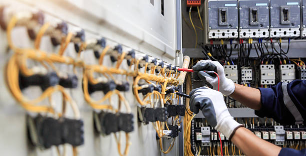 Professional Electrician technician working in Troy, AL